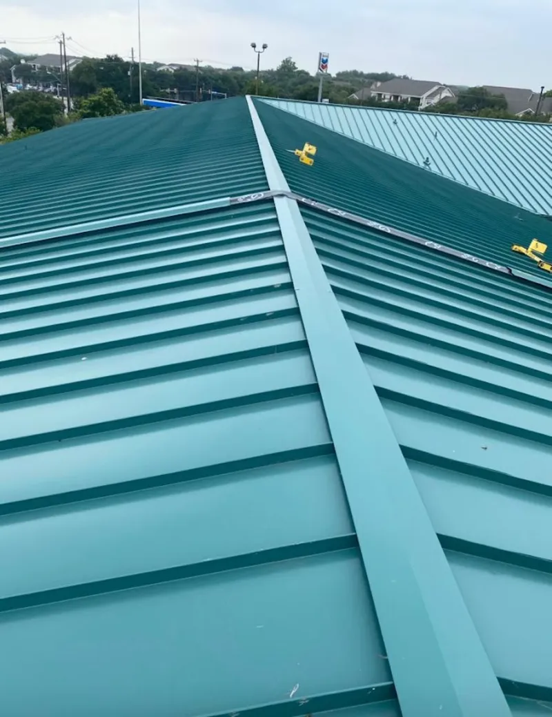 Green commercial metal roof ridge and valley for Metal Roof Repair in Apex